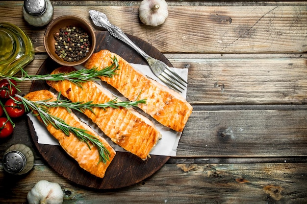 Grilled salmon fillet with spices and rosemary