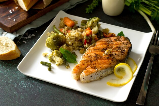 Grilled salmon steak couscous and vegetables Healthy food