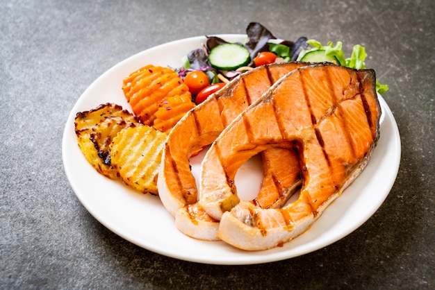 grilled salmon steak fillet with vegetable