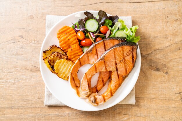 grilled salmon steak fillet with vegetable