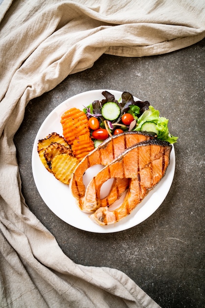 grilled salmon steak fillet with vegetable