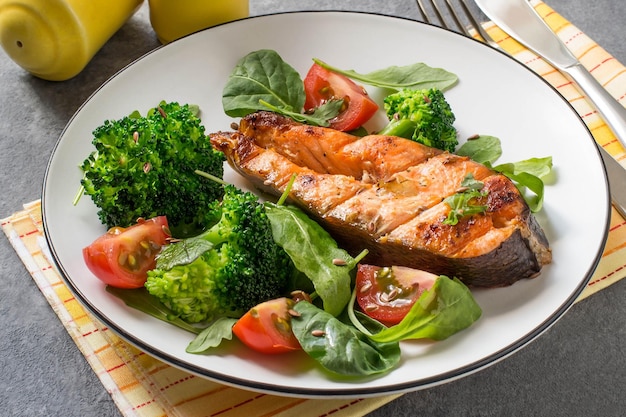 Grilled salmon steak and vegetables