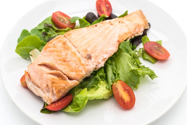 grilled salmon steak on white