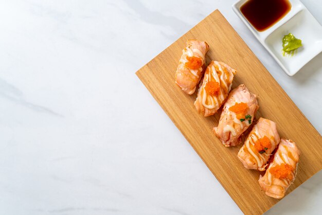 grilled salmon sushi on plate