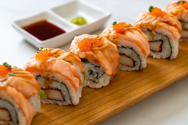 grilled salmon sushi roll with sauce