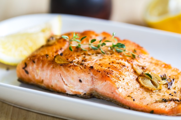 Grilled Salmon with garlic and herb by lemon