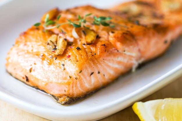 grilled salmon with garlic and herb by lemon