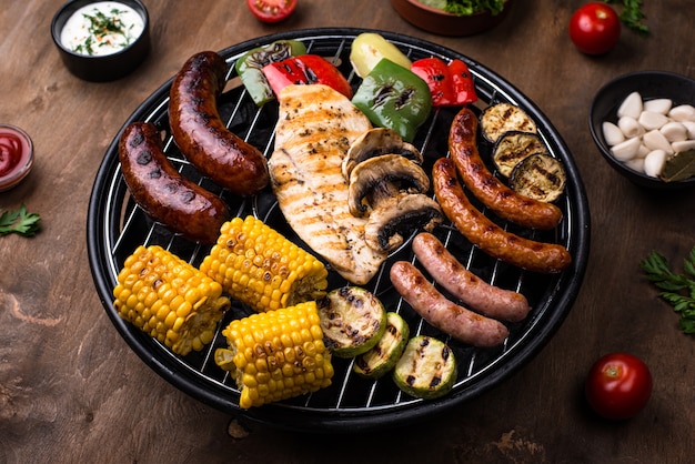 Grilled sausages meat and vegetables