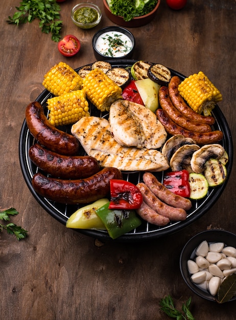 Grilled sausages meat and vegetables