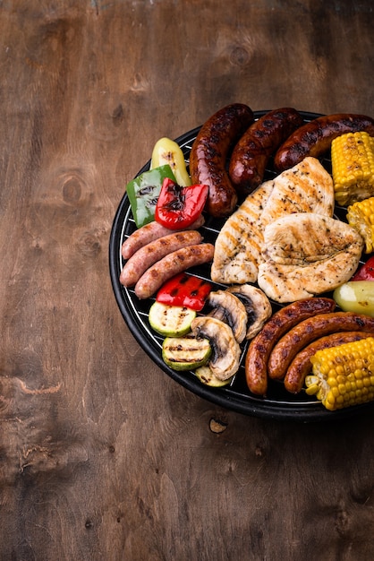 Grilled sausages meat and vegetables