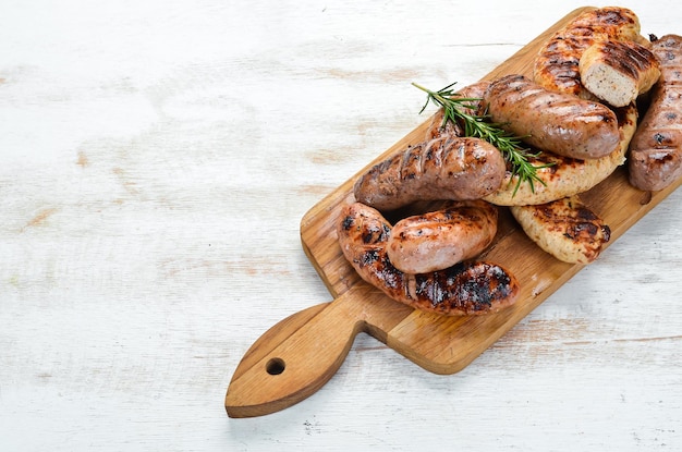 Grilled sausages with spices Barbecue Top view free space for your text Rustic style