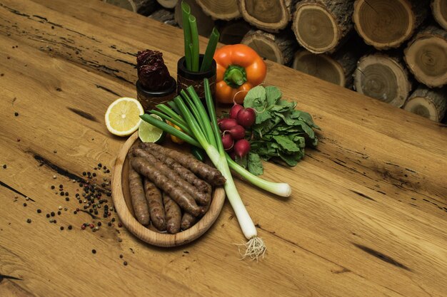 Grilled sausages on a wooden table