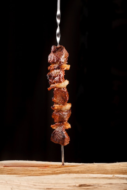 Grilled shish kebab meat on skewers