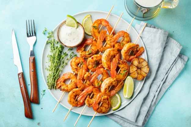 Grilled shrimp skewers or langoustines.