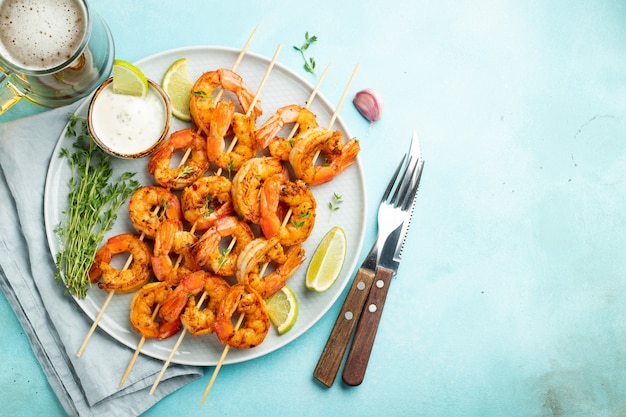 Grilled shrimp skewers or langoustines.