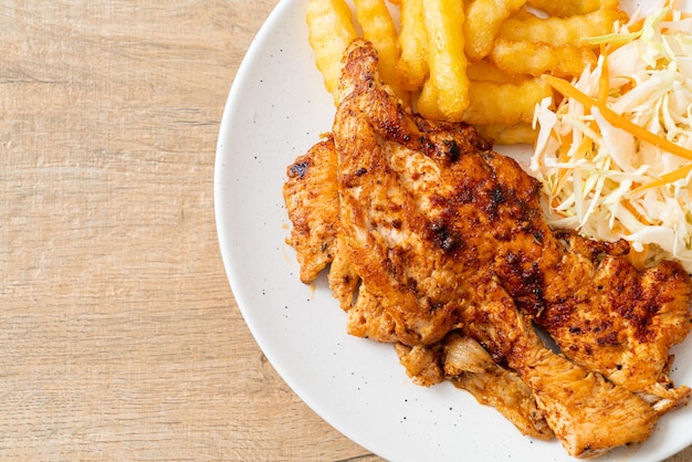 grilled spicy barbecue chicken steak with french fries