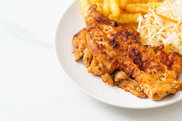 grilled spicy barbecue chicken steak with french fries