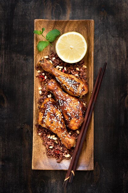 Grilled spicy chicken drumsticks with rice