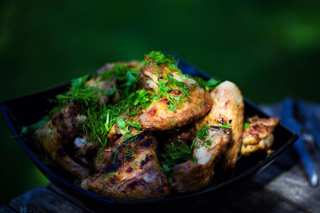 Foto gambe di pollo piccanti alla griglia