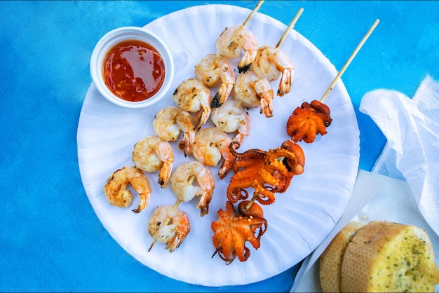 Grilled squid and grilled shrimp with spice street food in thailand