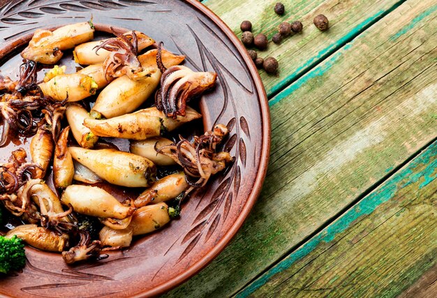 Grilled squids in plate