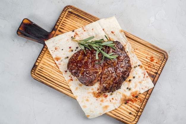 Grilled steak on the bone