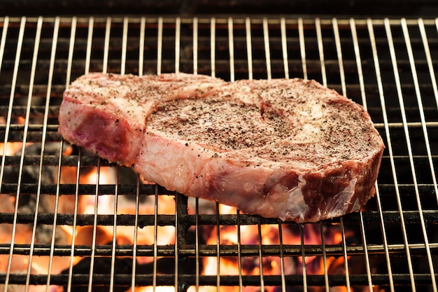 Grilled steak on hot grill 