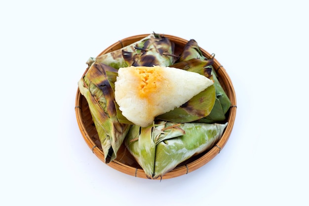 Grilled sticky rice in banana leave with mung beans filling