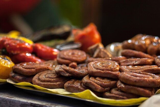 Grilled street food meat sausage and vegetables