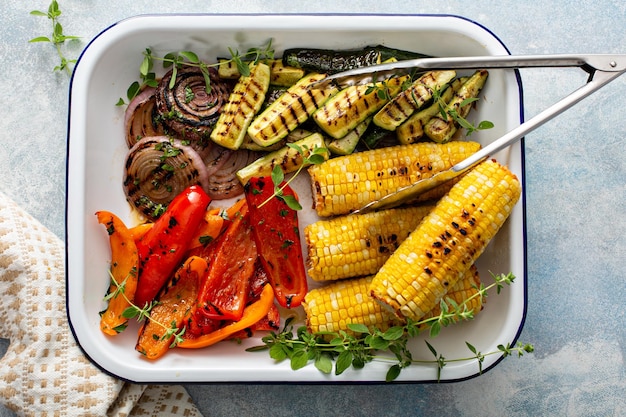 Grilled summer vegetables on a tray just cooked and ready to eat