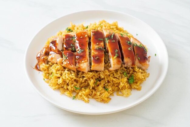 grilled sweet and chilli chicken with curry rice on plate