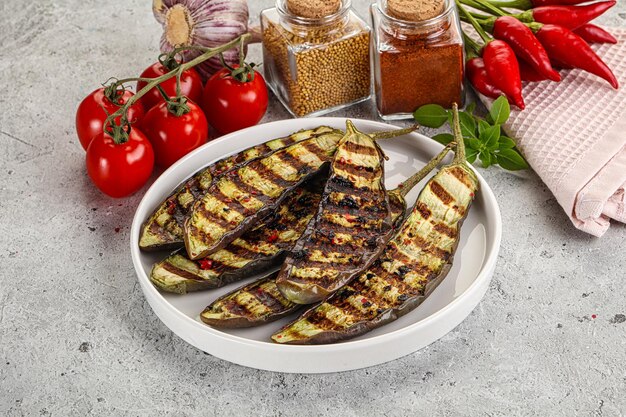 Grilled tasty ripe eggplant slice in the bowl