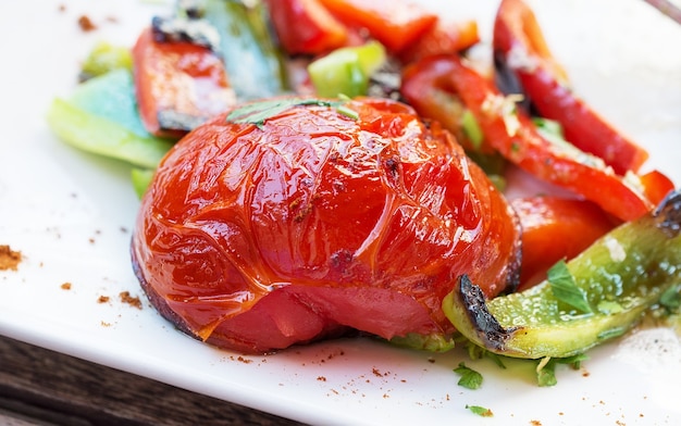 Grilled vegetables. Tomato and bell pepper slices.