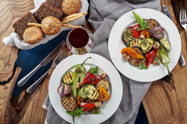 Grilled vegetables on a white plates. restaurant dish