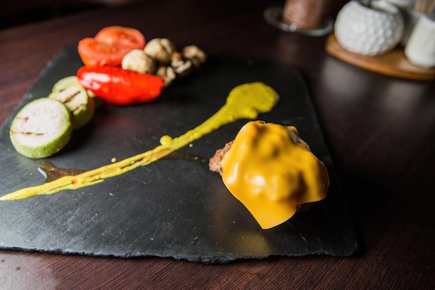 Grilled vegetables on a wooden board. High quality photo