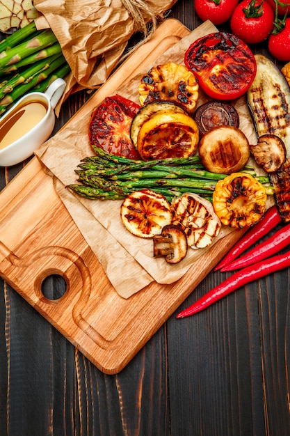 Grilled vegetables on wooden table