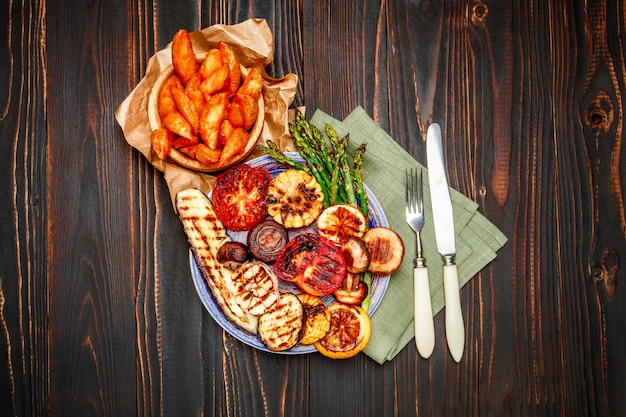 Grilled vegetables on wooden table