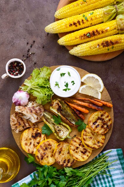 Grilled vegetables on a wooden tray