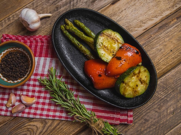 Grilled vegetables zucchini asparagus pepper preparing on the grill village cuisine