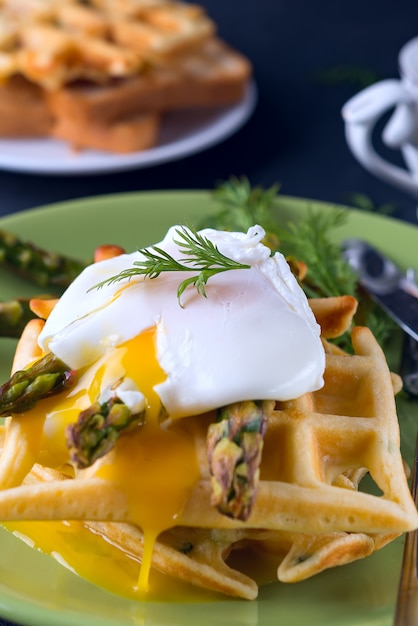 Grilled waffle with Green boiled Asparagus with Poached Egg