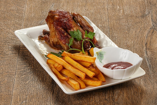 Grilled whole chicken with fried potato