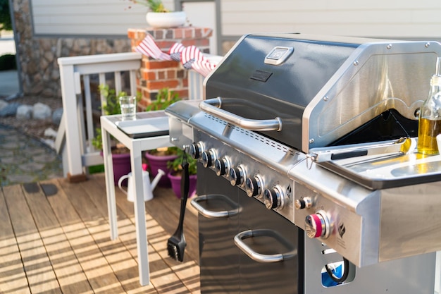 Grilling outdoor on a gas burning grill on the backyard patio.