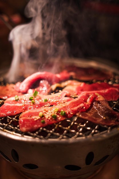 Grilling wagyu beef on charcoal grill