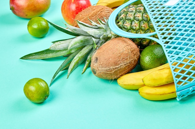 Grocery shopping bag with organic exotic fruits.