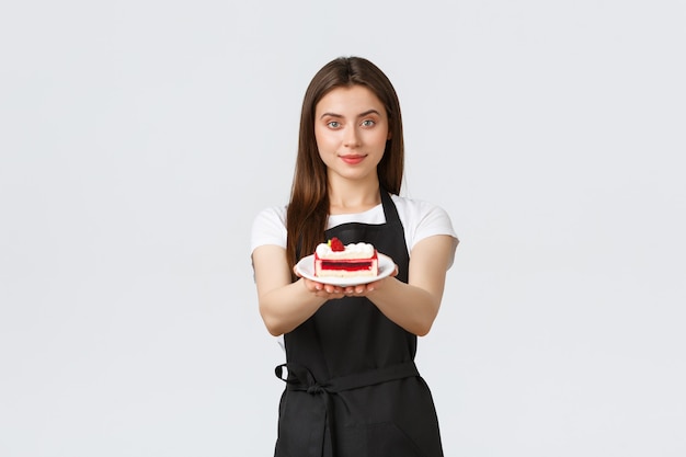 grocery store employees small business and coffee shops concept friendly smiling barista extend hand...