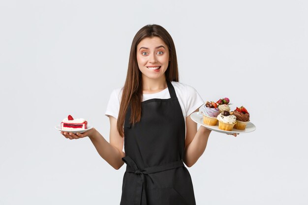 Grocery store employees small business and coffee shops concept friendly smiling waitress in cafe ho...