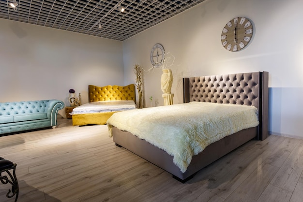 Grodno belarus december 2018 big double bed in chester style\
for elite loft interior in expensive store showroom of\
furniture