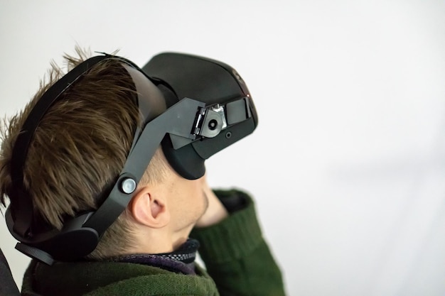 Grodno belarus june 012020 a young girl and a young guy use
virtual reality glasses to play games or present new technologies
the operator girl is holding a smartphone and a controllers use
vr