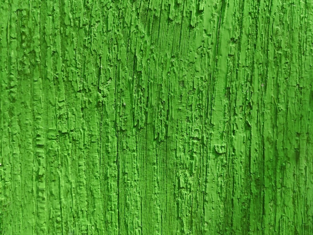 Foto groene achtergrond en textuur geschilderd hout van natuurlijk hout