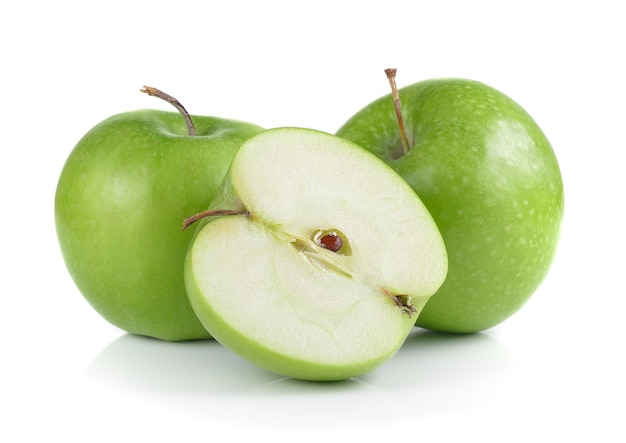 Groene appel op witte muur